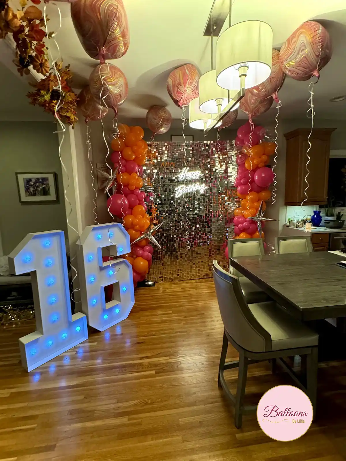 Luxury shimmer wall and balloon decor inspiration for milestone events