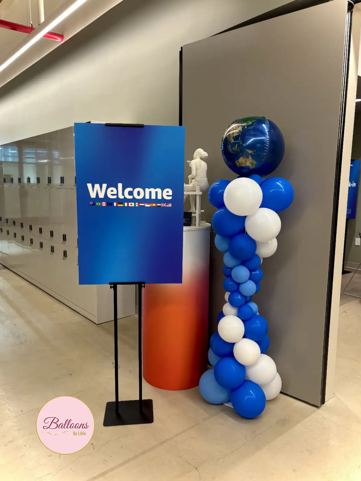 Welcome sign and balloon column for registration or guest arrival